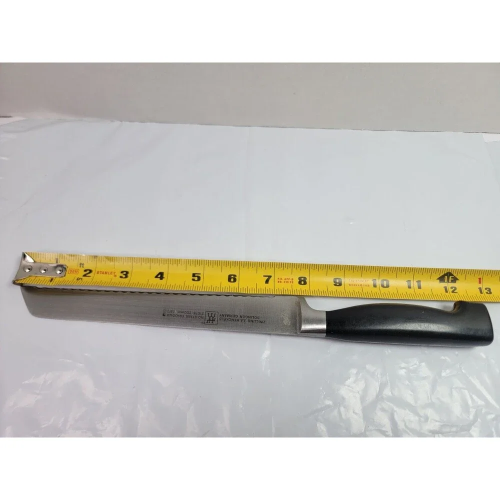 Zwilling J.A. Henckels Four Star 8” Serrated Bread Knife 31076-200 Germany